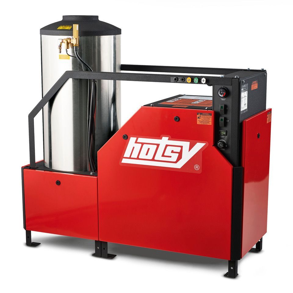 Red industrial machine with red cabinet, black frame, and tall stainless steel cylinder on top.