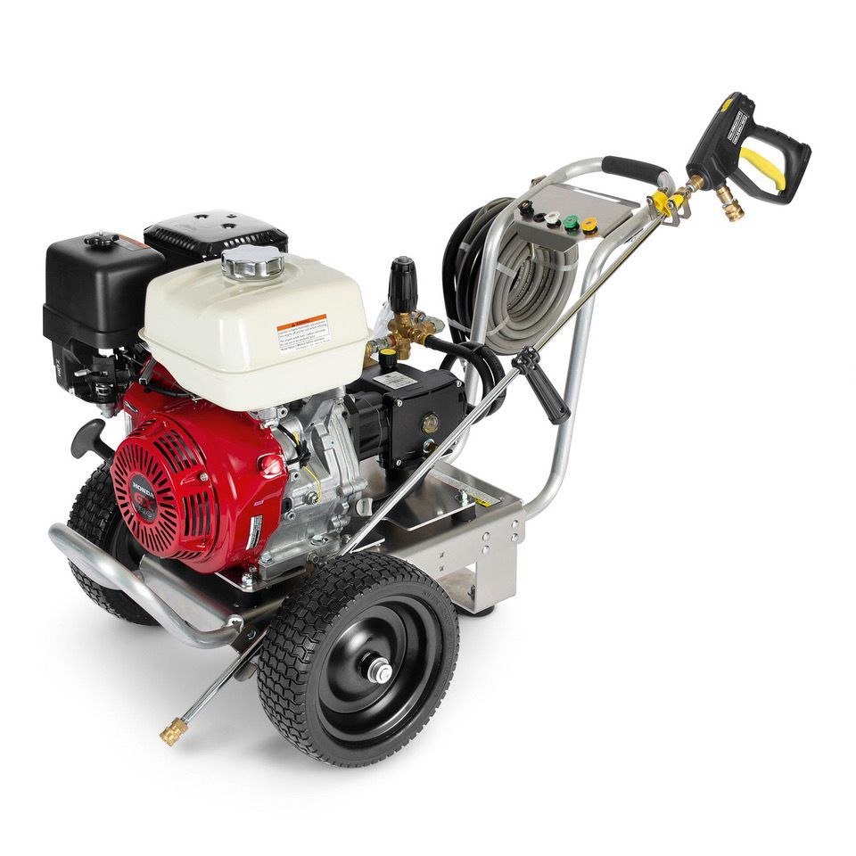 Gas-powered pressure washer on a wheeled frame, with red engine, white tank, hose reel, and spray wand