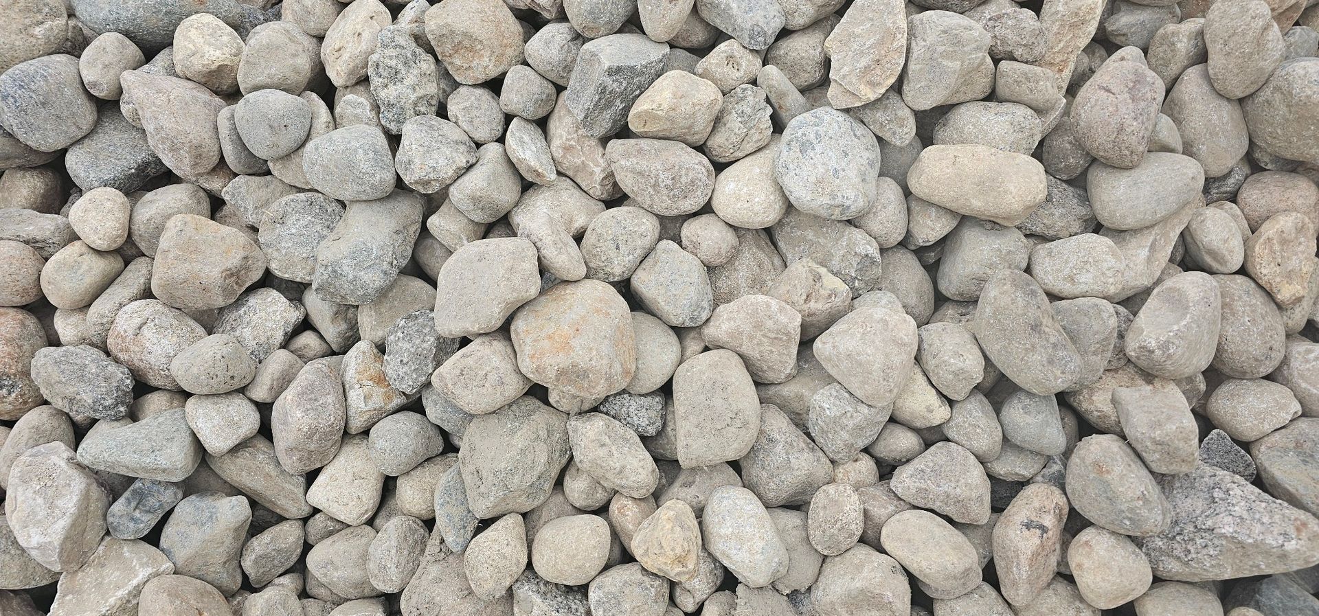 There are two different types of rocks in this pile.