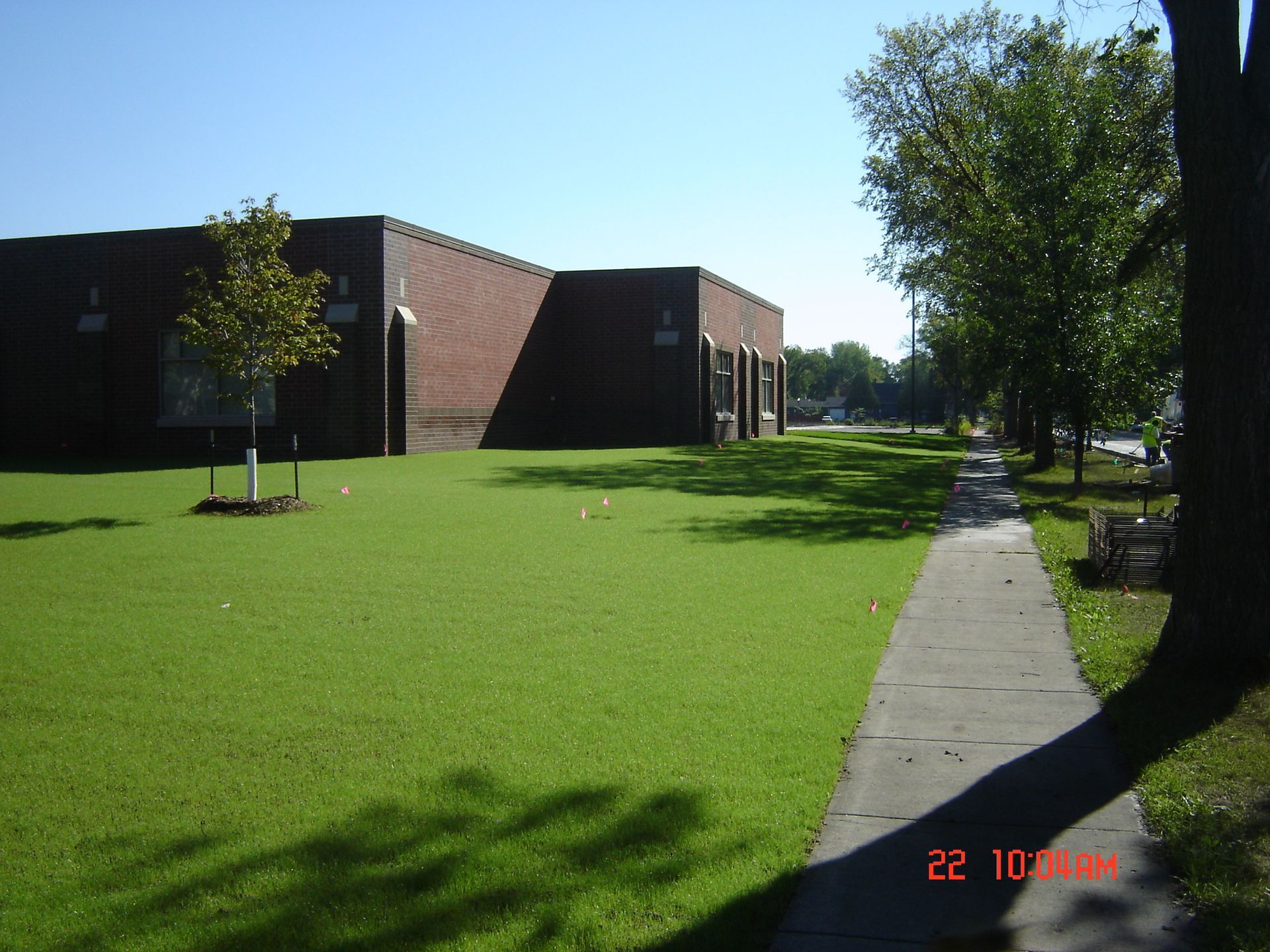 A brick building with the number 22 on the side of it