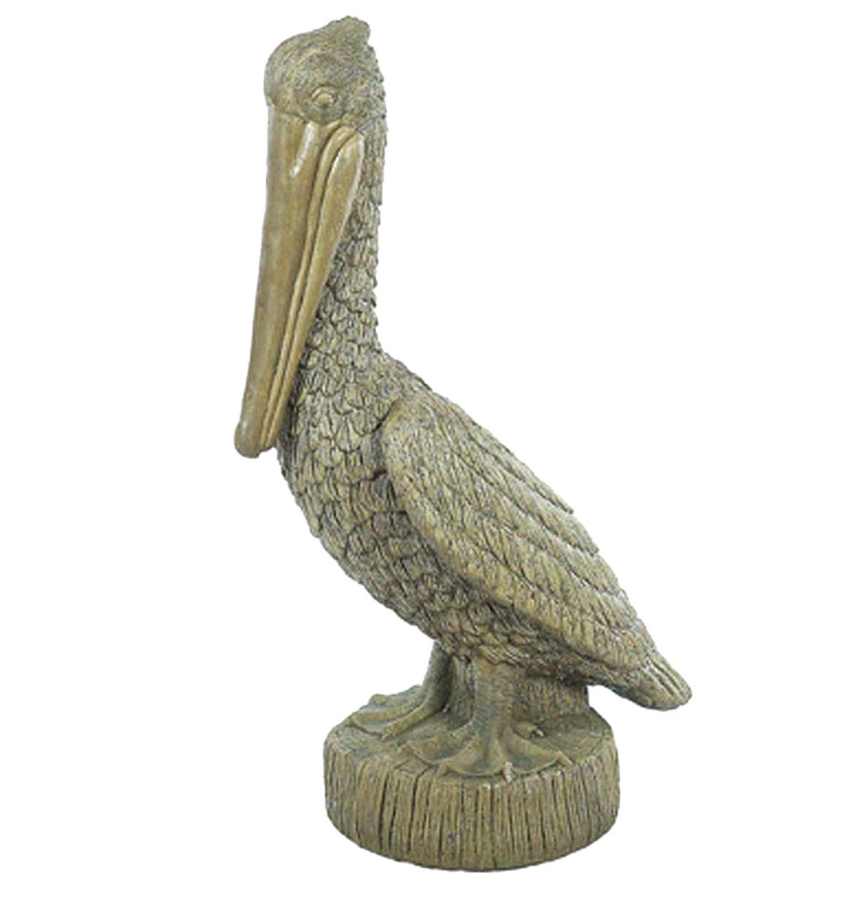 Statue of a brown pelican standing on a textured, round base.