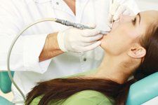 woman under dental checkup