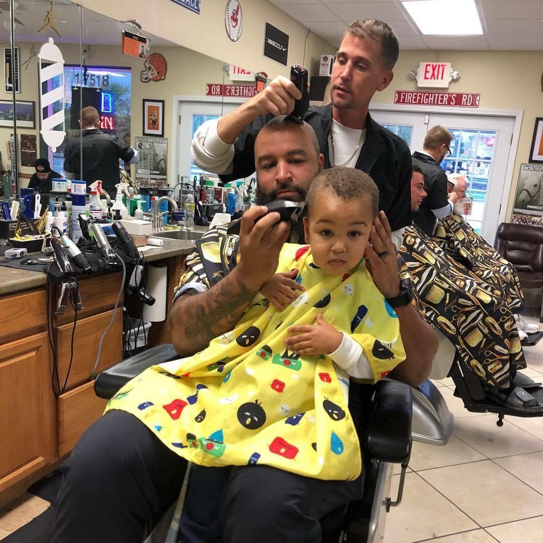Barber making haircut