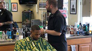 Male barber cutting hair