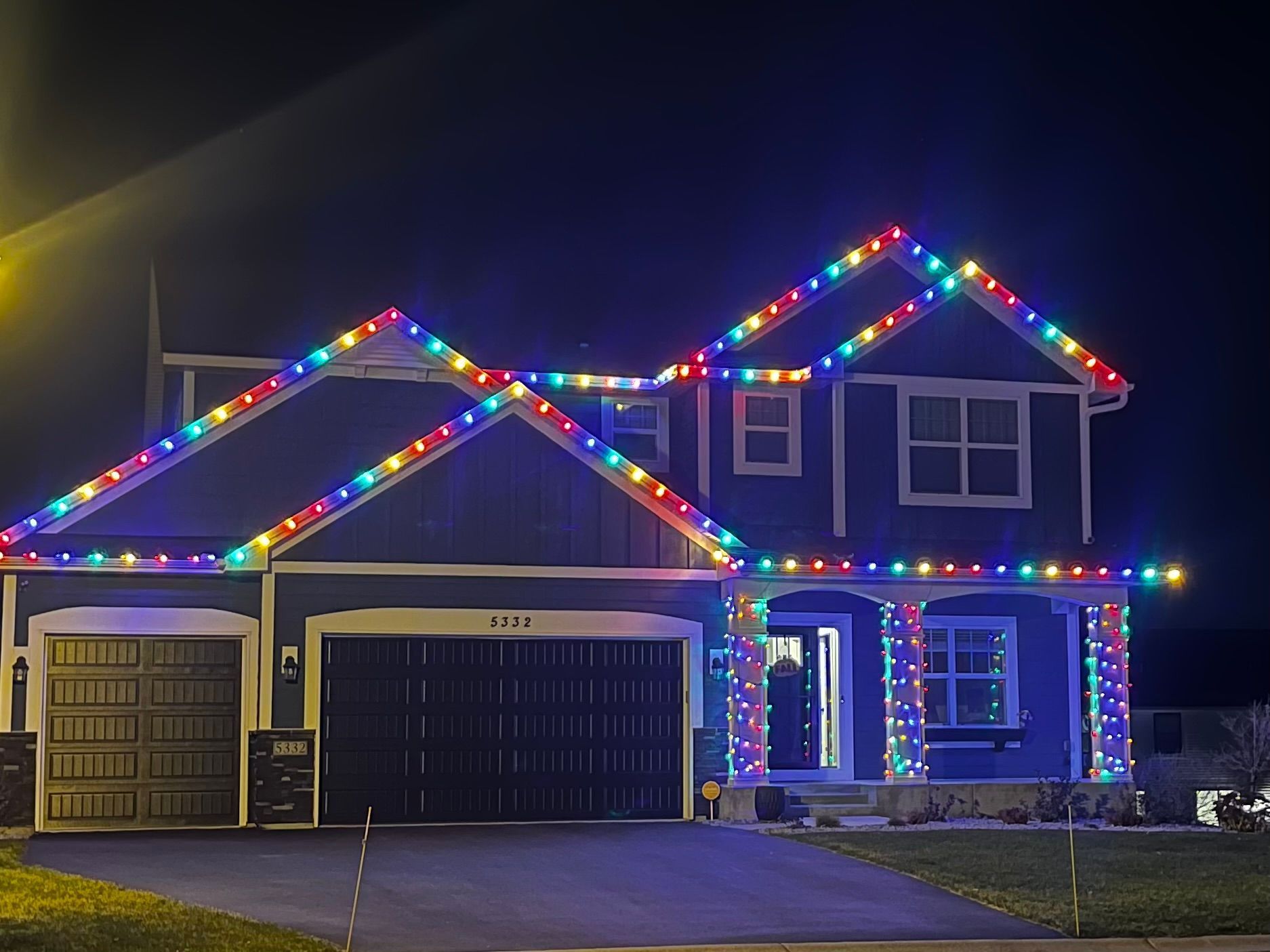 A house is decorated with Christmas lights.