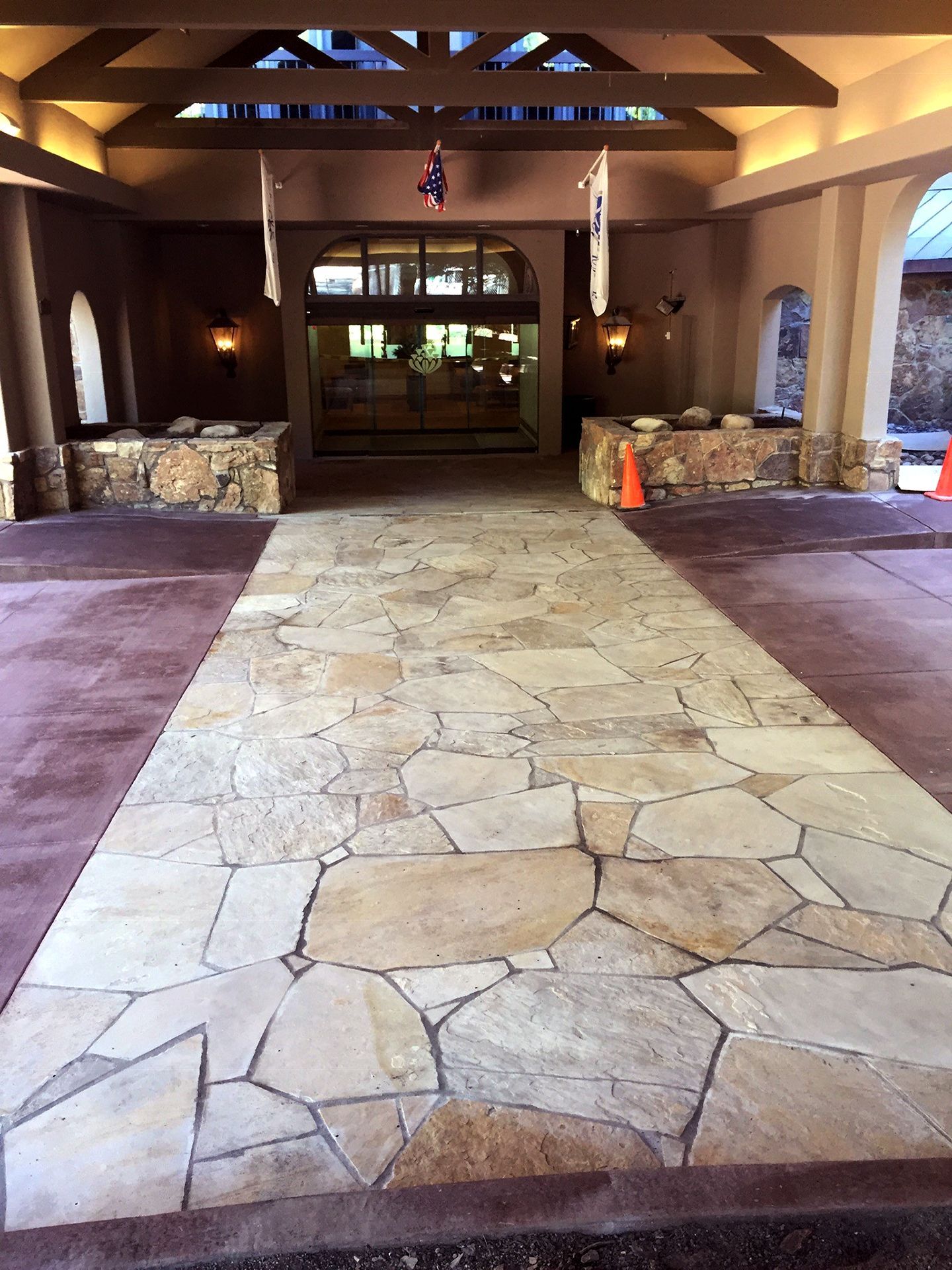 A stone walkway leading to the entrance of a building