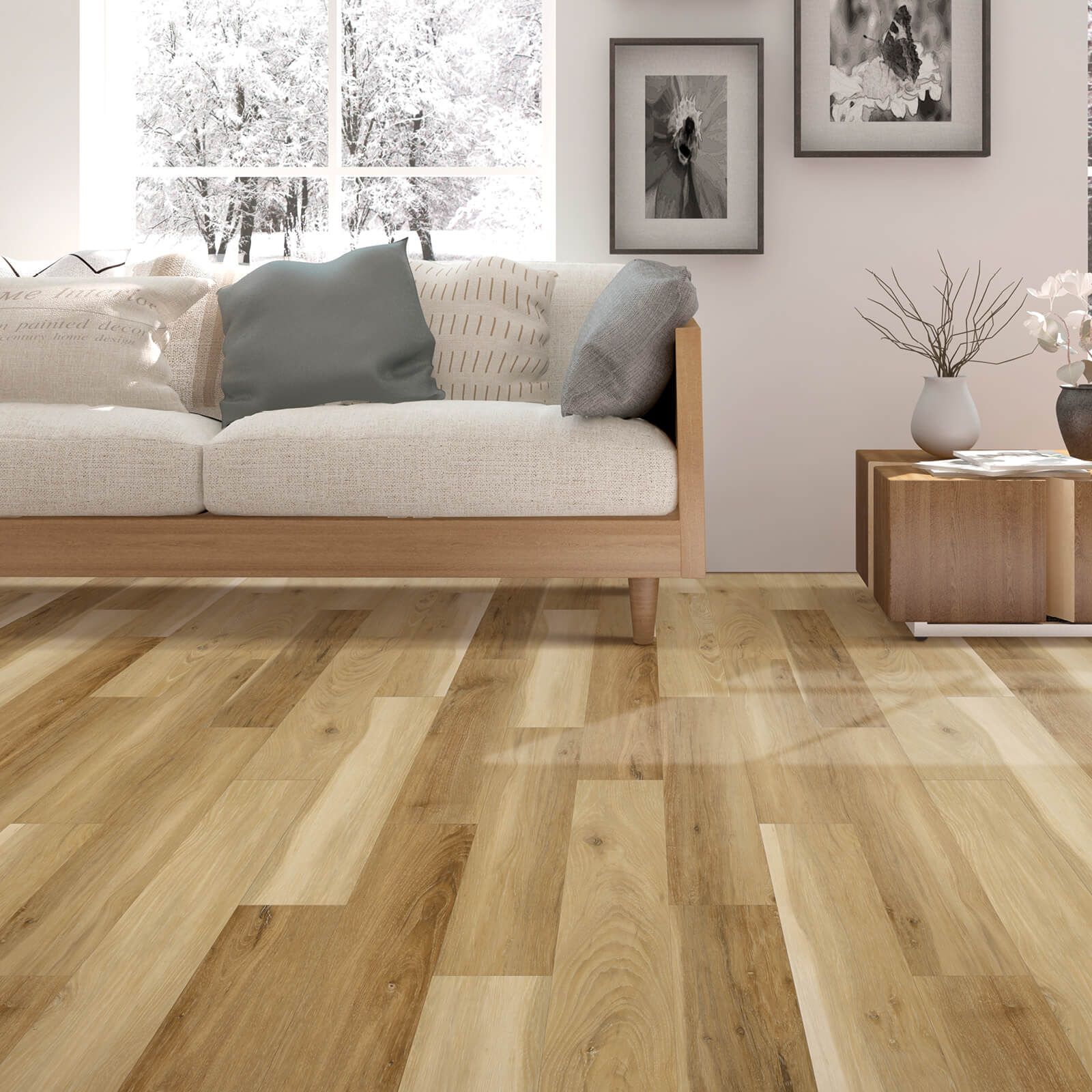 A living room with a couch and a wooden floor