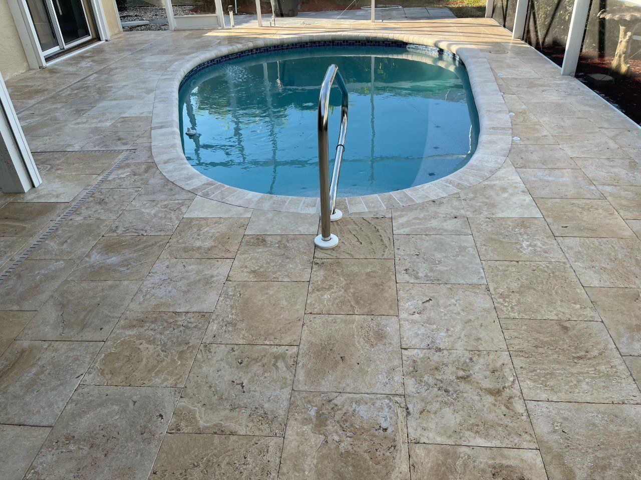 A swimming pool with a staircase leading to it