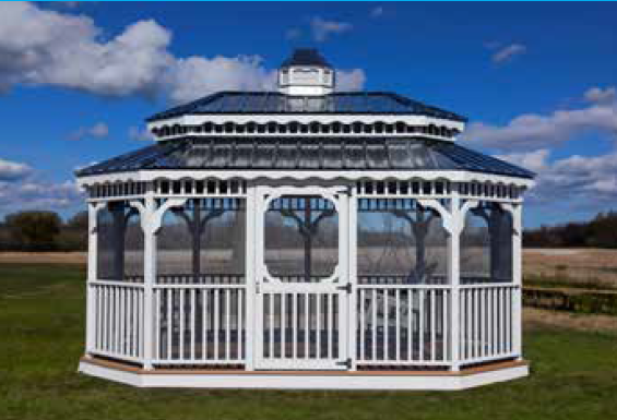 White octagon gazebo with screened walls, a dark blue roof, and a small cupola, set in a grassy field.