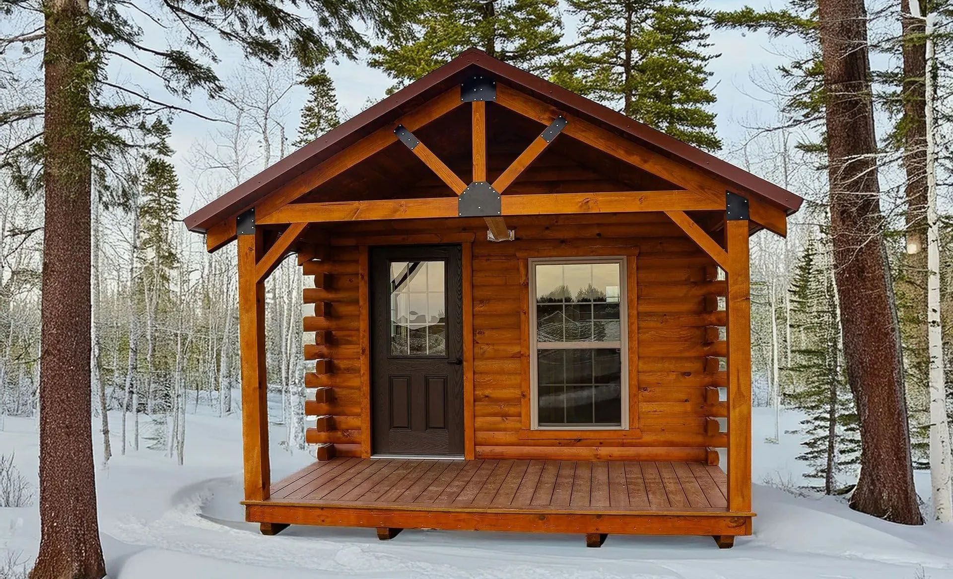 Wooden cabin with porch in a snowy forest. Brown logs, dark door, window.