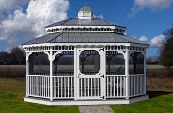 White gazebo with a gray roof on a green lawn with a cloudy sky.