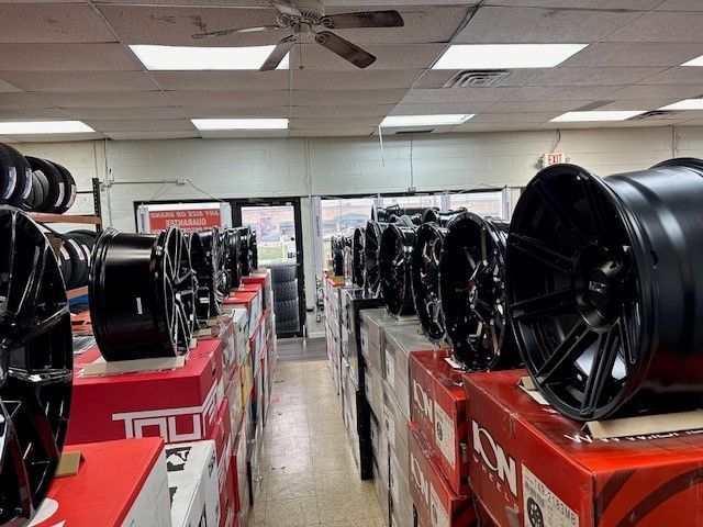 A store filled with lots of wheels and tires