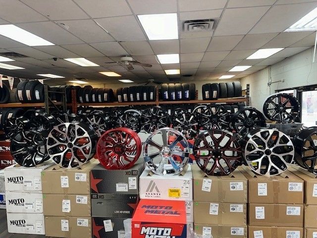A store filled with lots of wheels and tires
