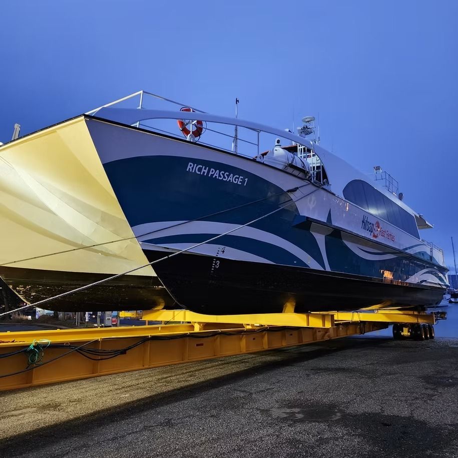 A boat with the name rich passage on it