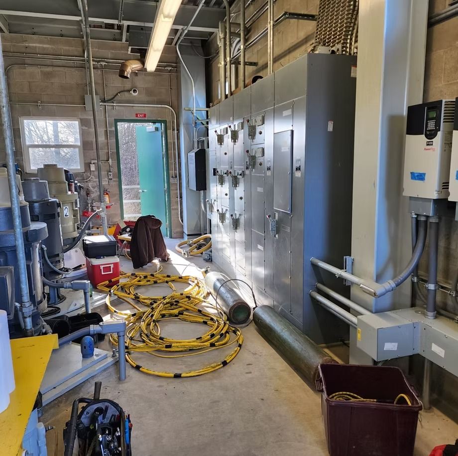 A room filled with lots of wires and electrical equipment