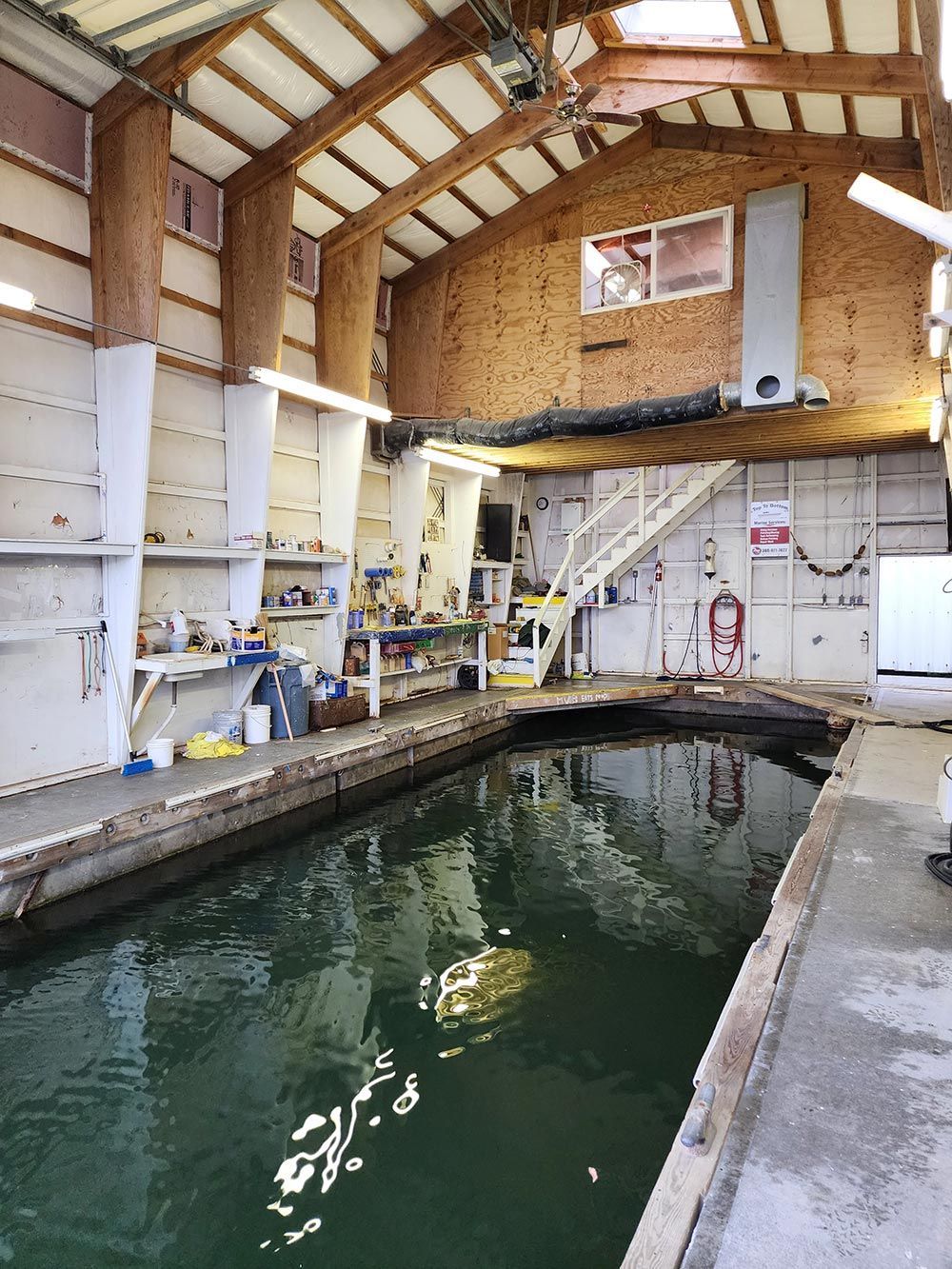 The inside of a building with a large pool of water