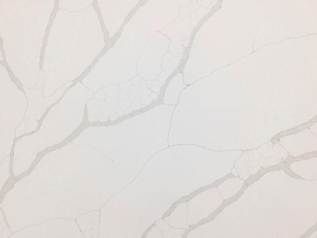 White countertop with gray veining.