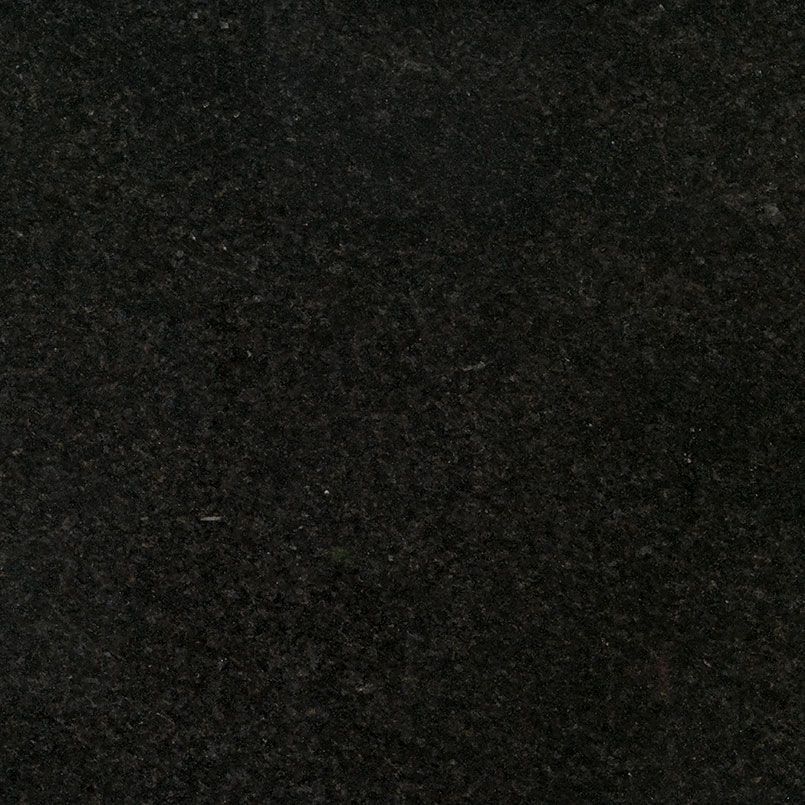 Black granite surface with small speckled details.