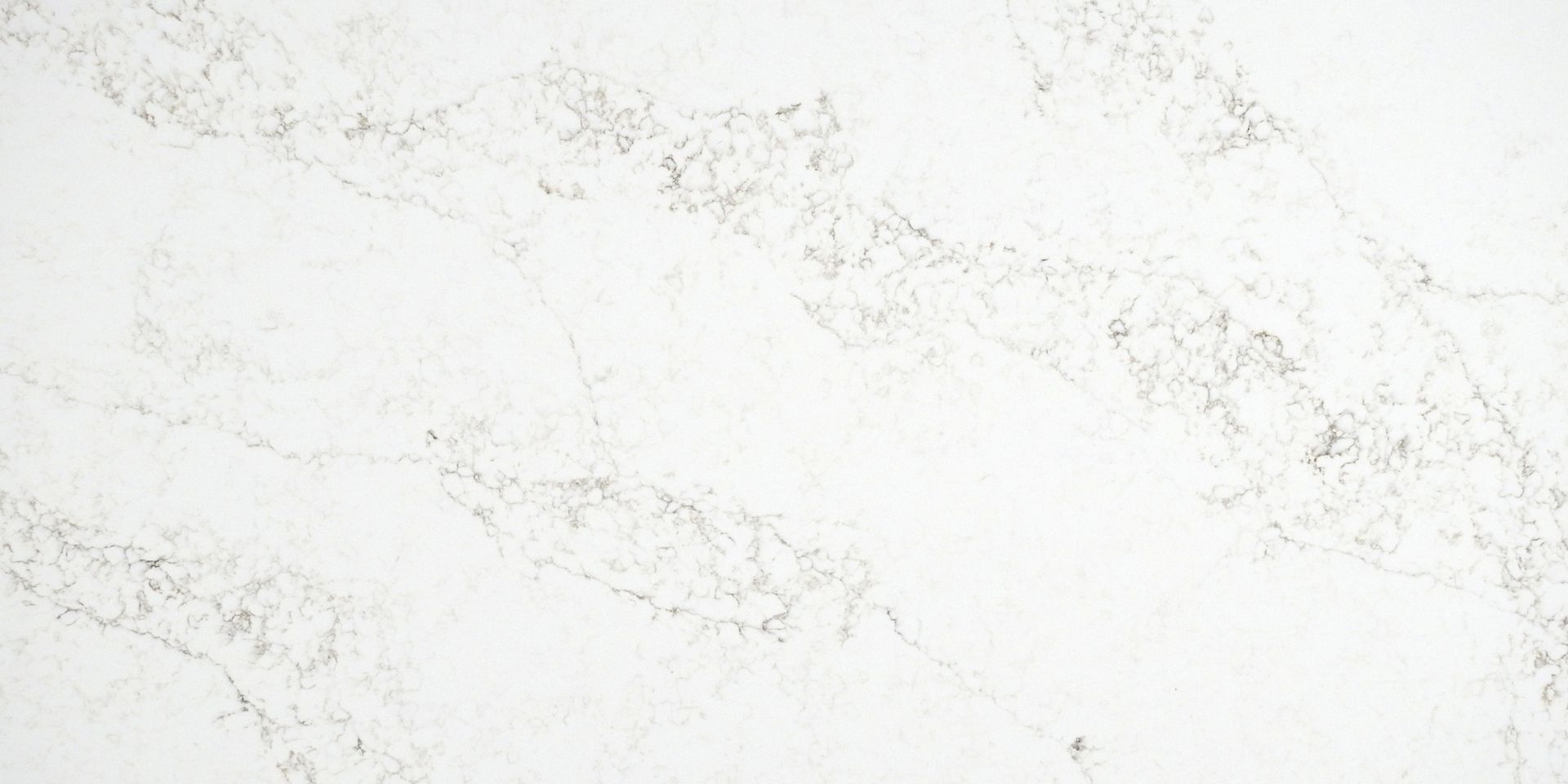 White marble surface with gray veining.