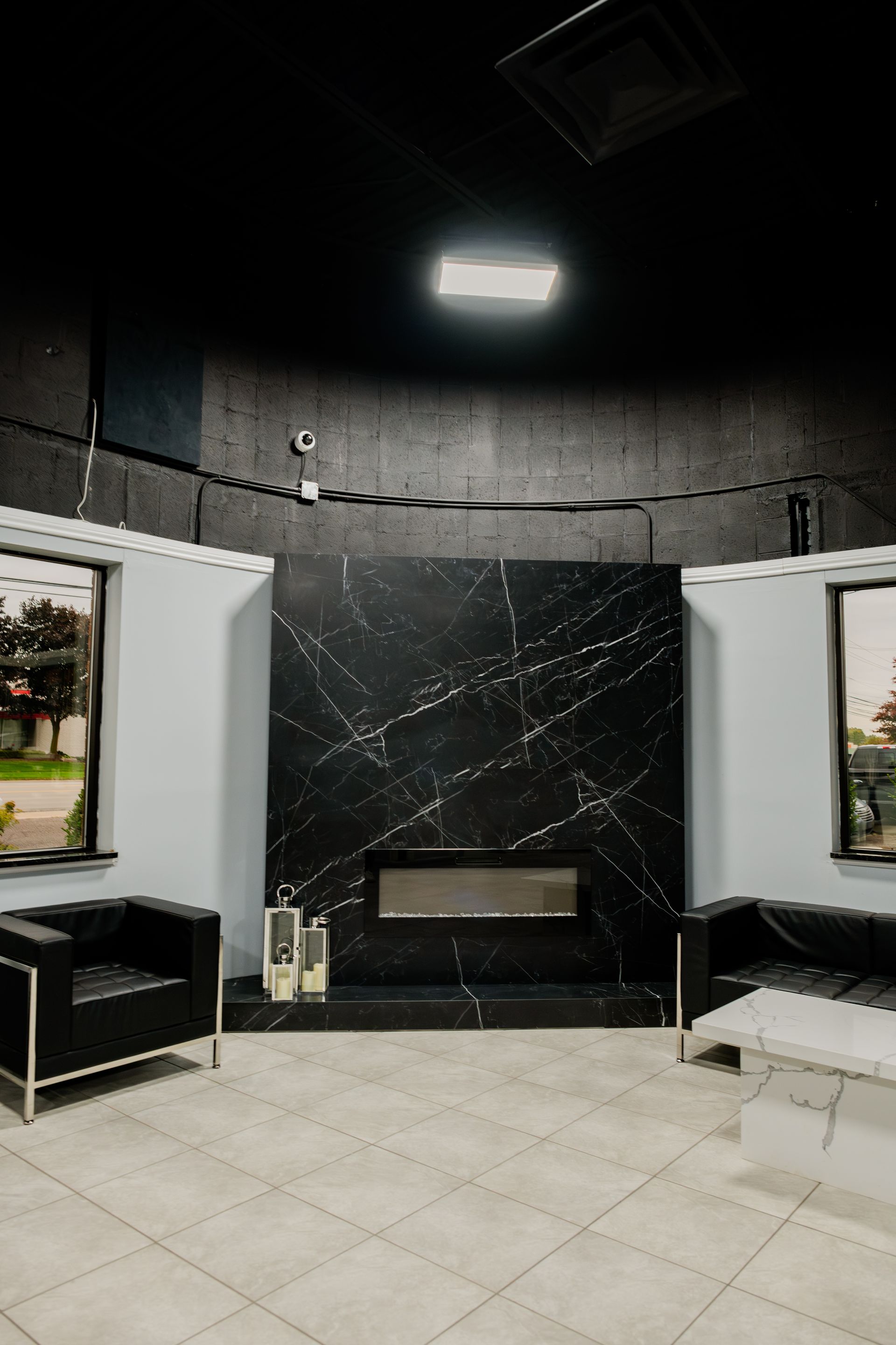 Modern lobby with black marble fireplace
