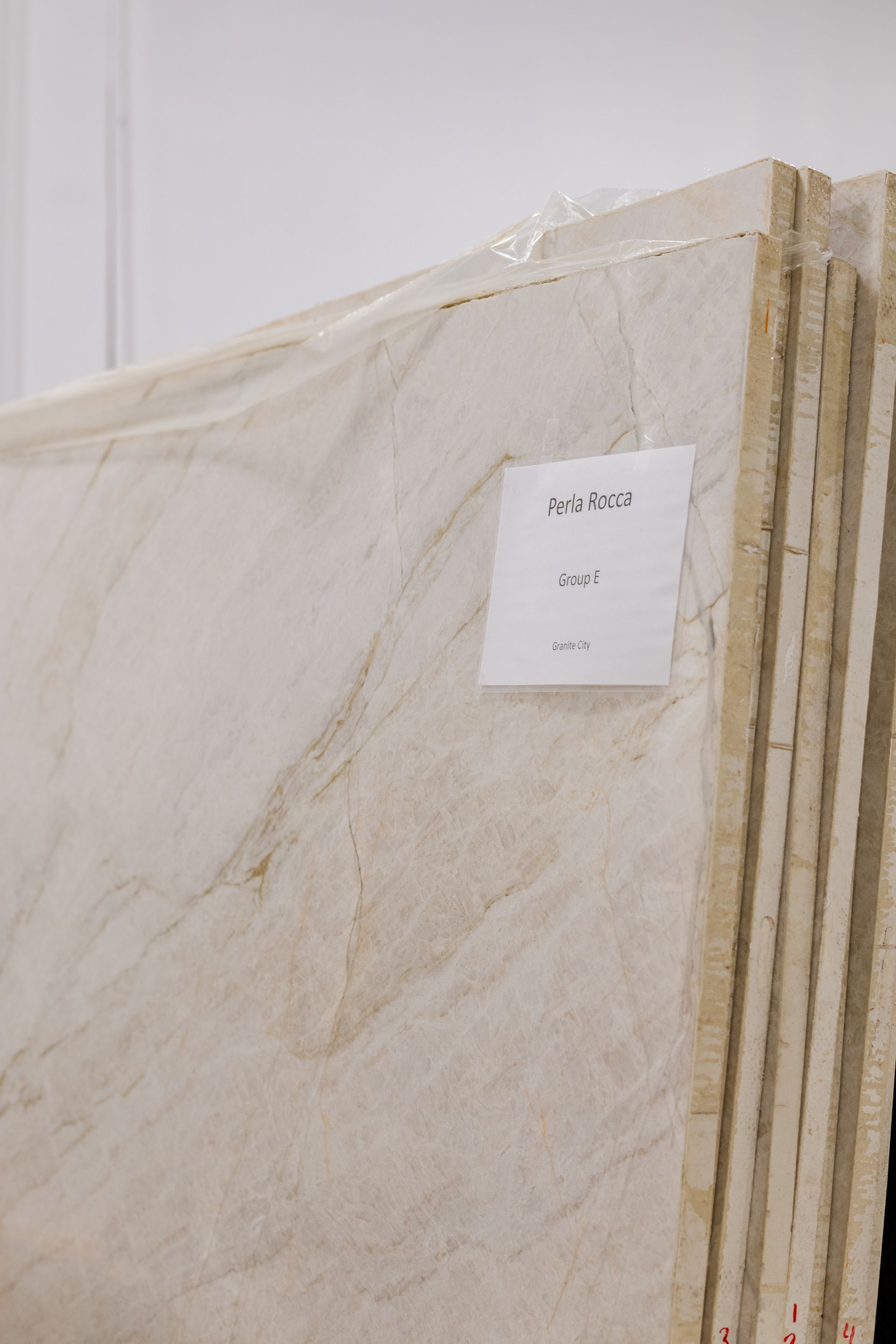 Stacked beige marble slabs 