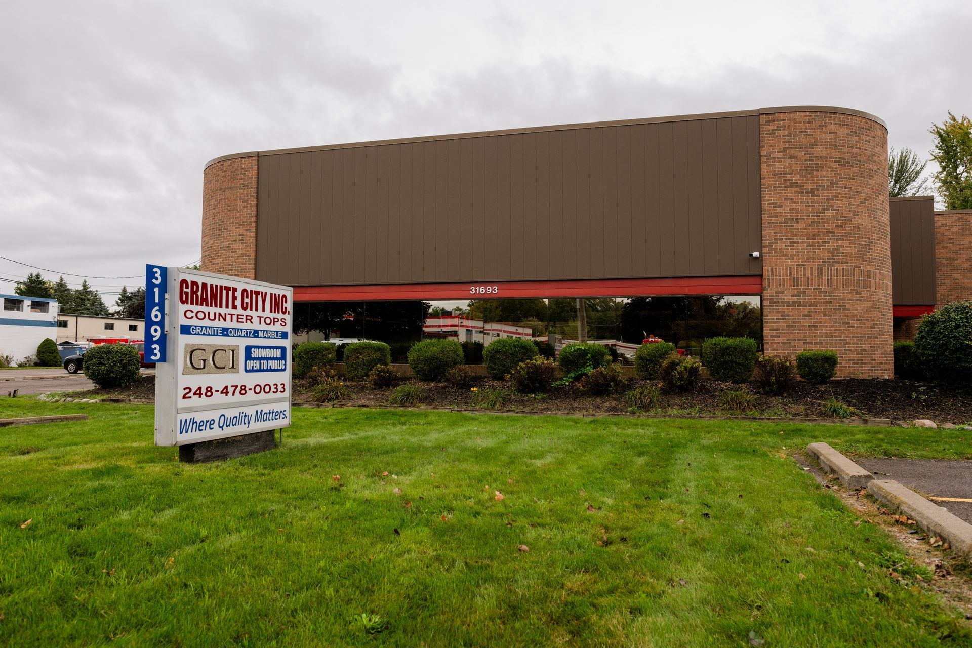 Commercial building with a sign in front
