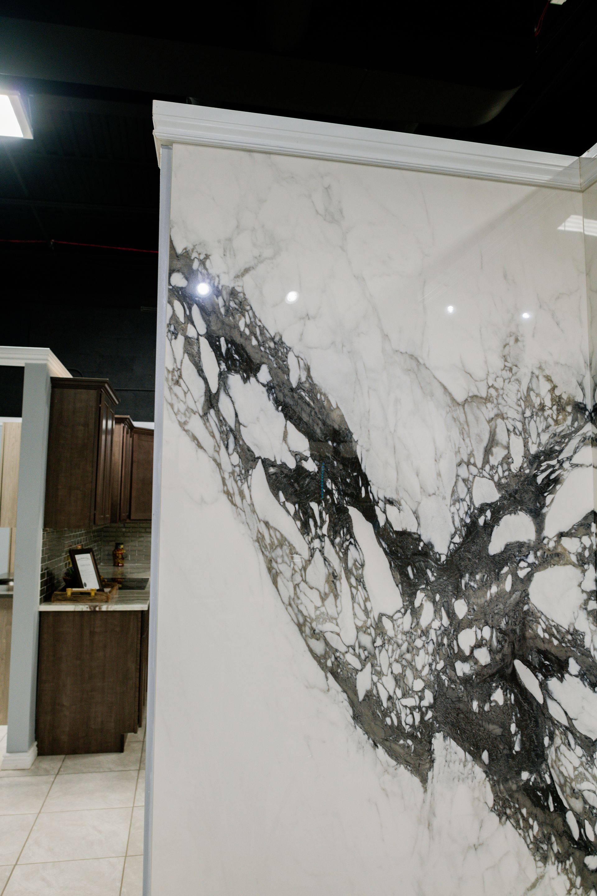 White marble slab with dramatic black veining displayed indoors