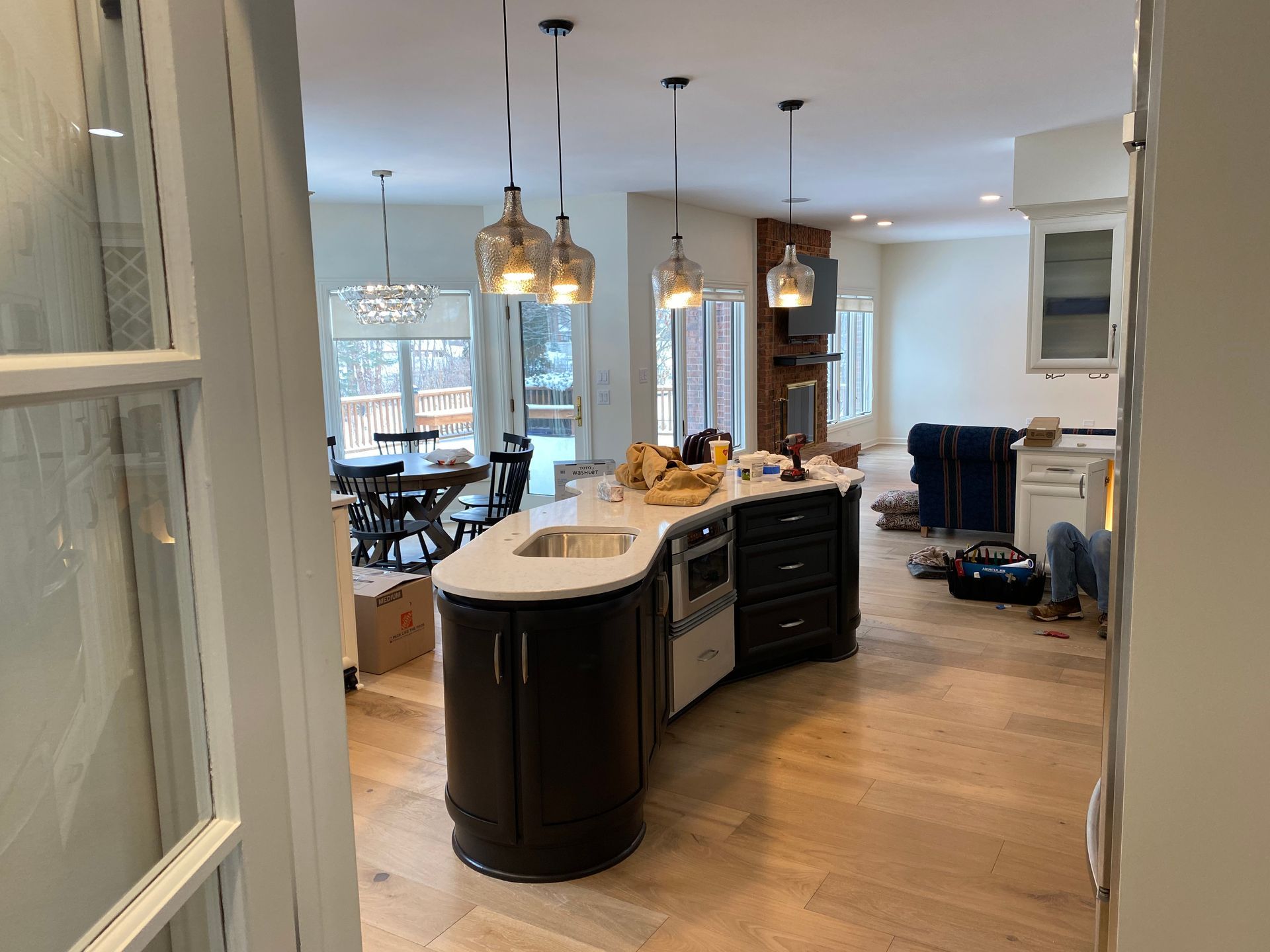 A kitchen with a large island in the middle of the room.