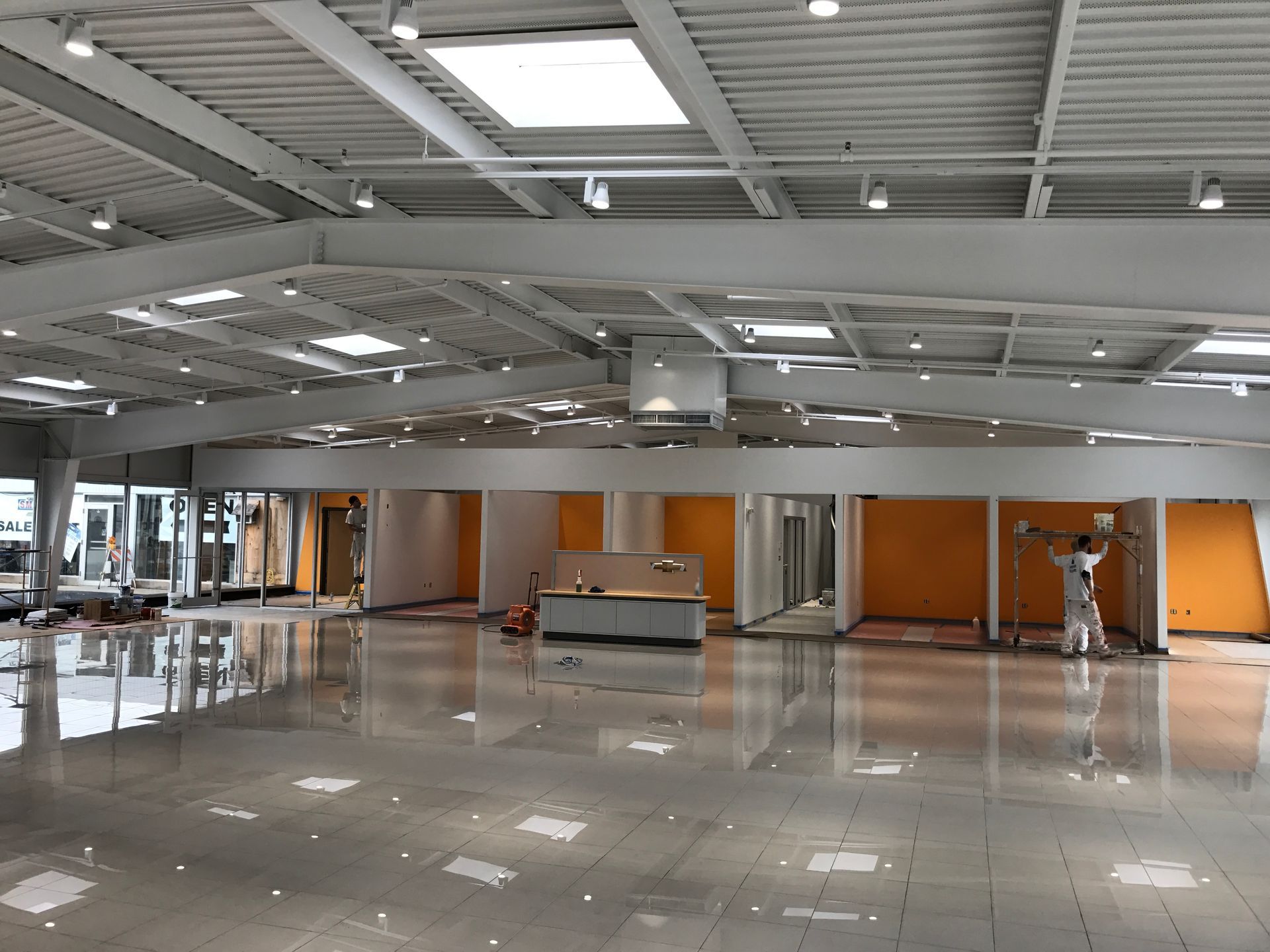 A large empty building with a lot of windows