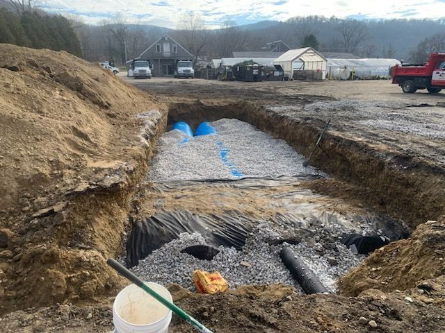 The Bouchard Construction Inc experts working on a drainage site