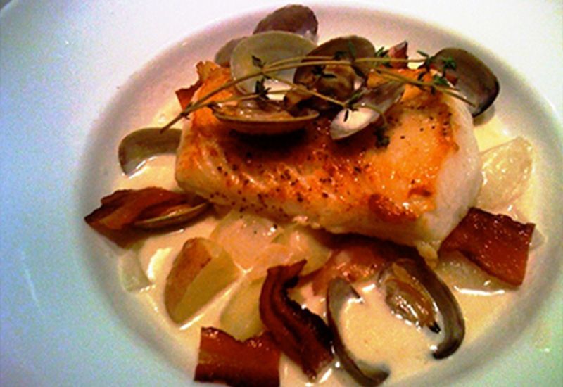 Pan-seared fish with clams