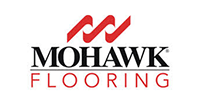Logo for Mohawk Flooring featuring a red abstract icon above the black text 