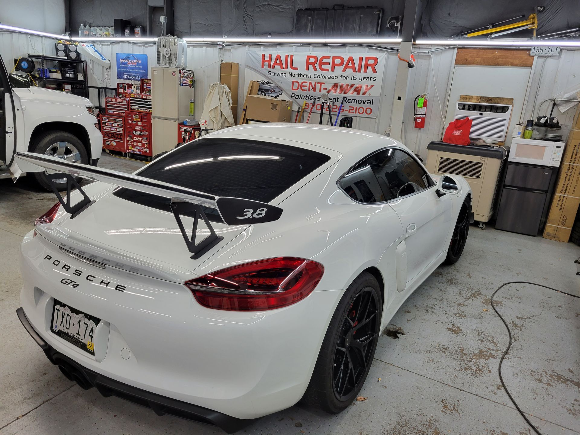 white car paintless dent removal