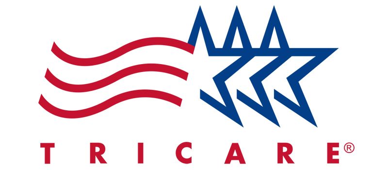 TRICARE logo with red waves and blue star emblem on white background