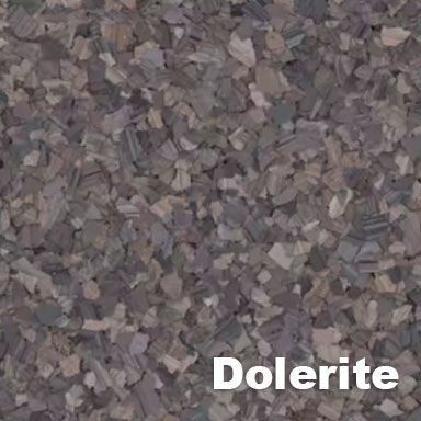 Dolerite, a dark gray igneous rock with a coarse-grained texture.
