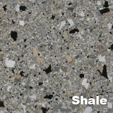 Close-up of a speckled, gray surface called 