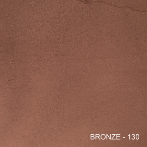 A close up of a brown surface that says bronze 130