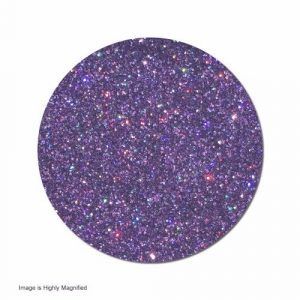 A close up of a purple glitter circle on a white background