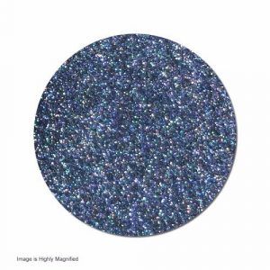 A close up of a circle of blue glitter on a white background