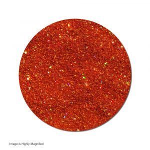 A close up of a circle of orange glitter on a white background.