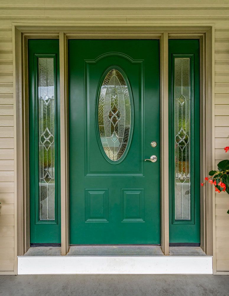 A green front door with a stained glass window