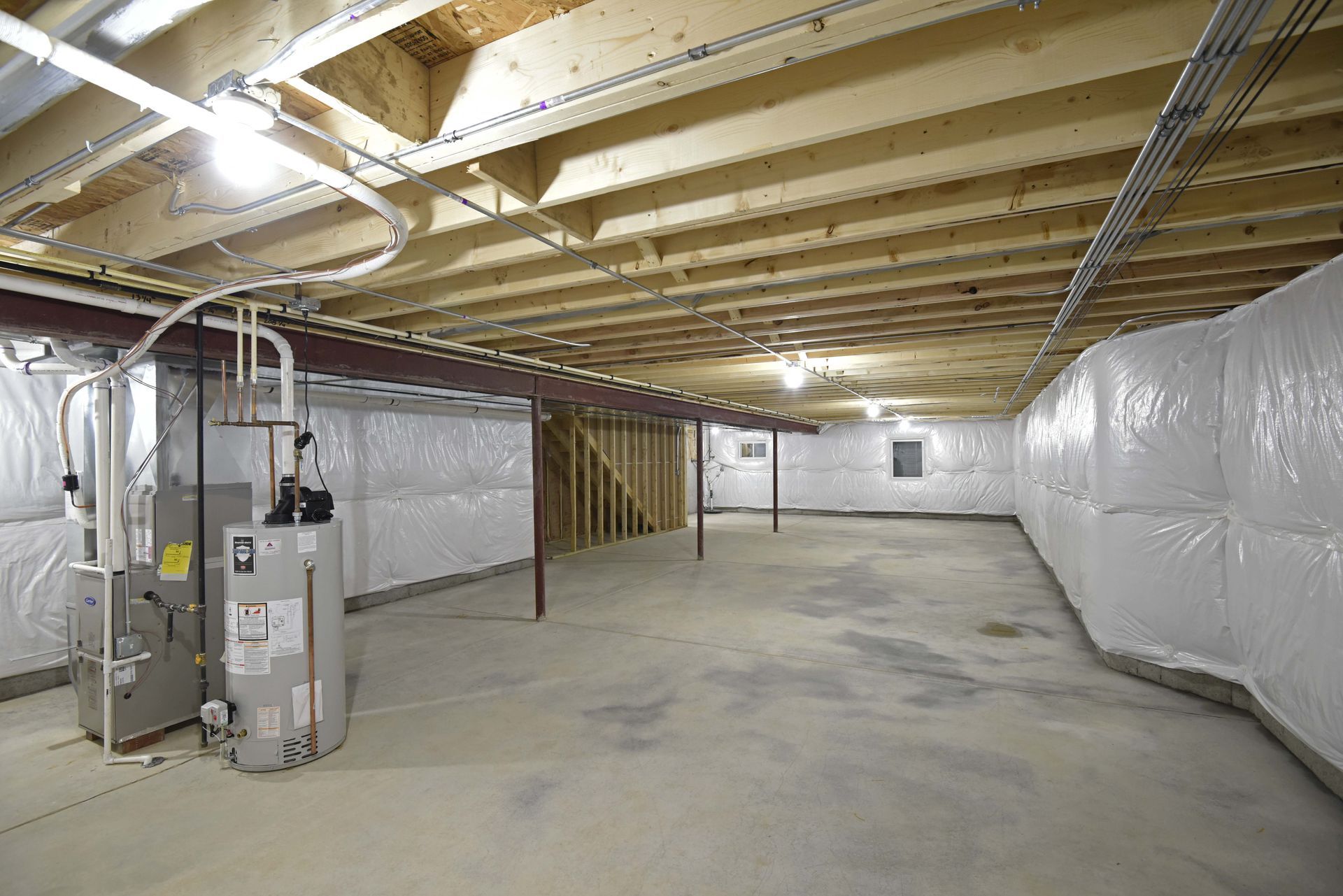 A living room with a fireplace and a ceiling fan