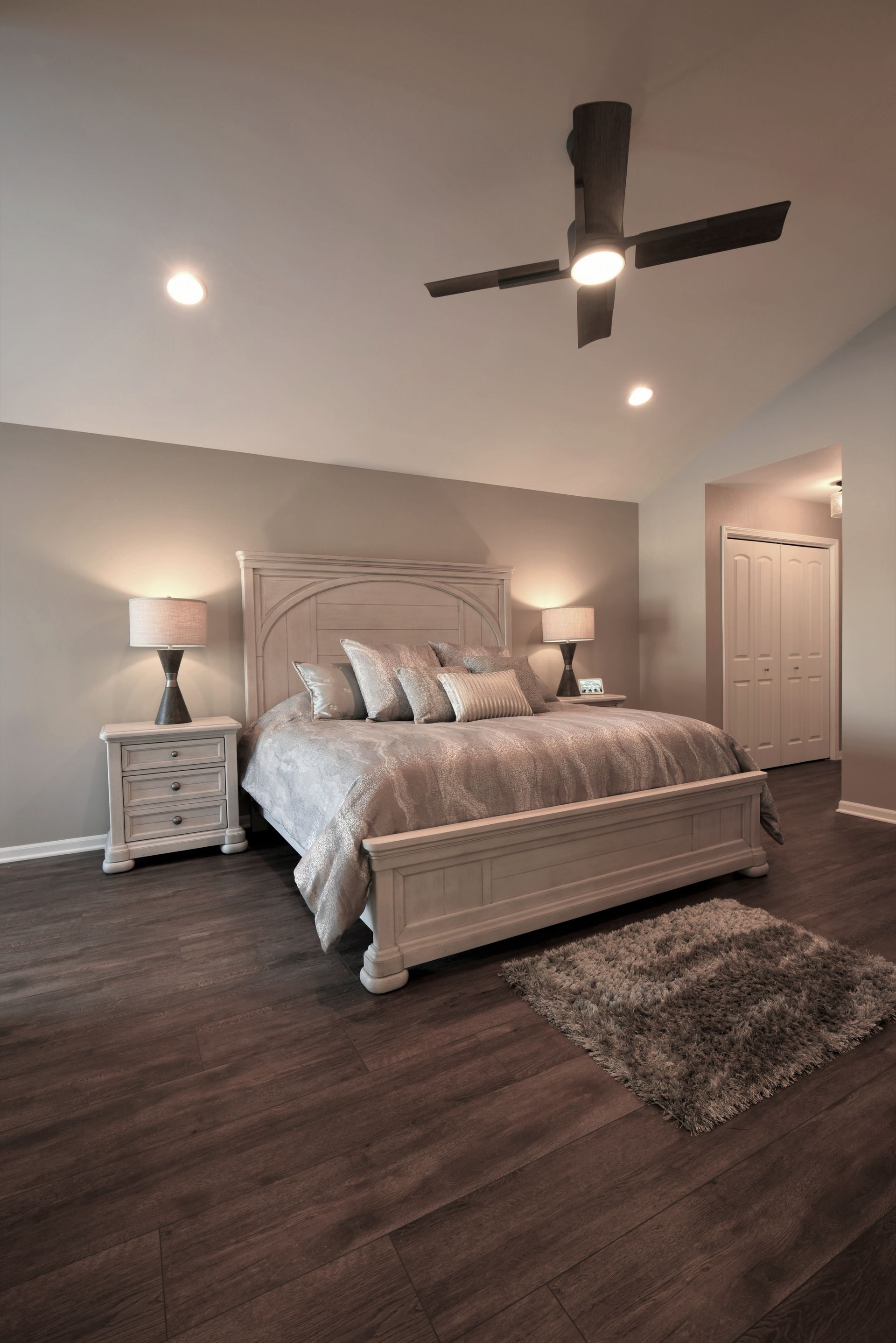 A kitchen with stainless steel appliances and a large island