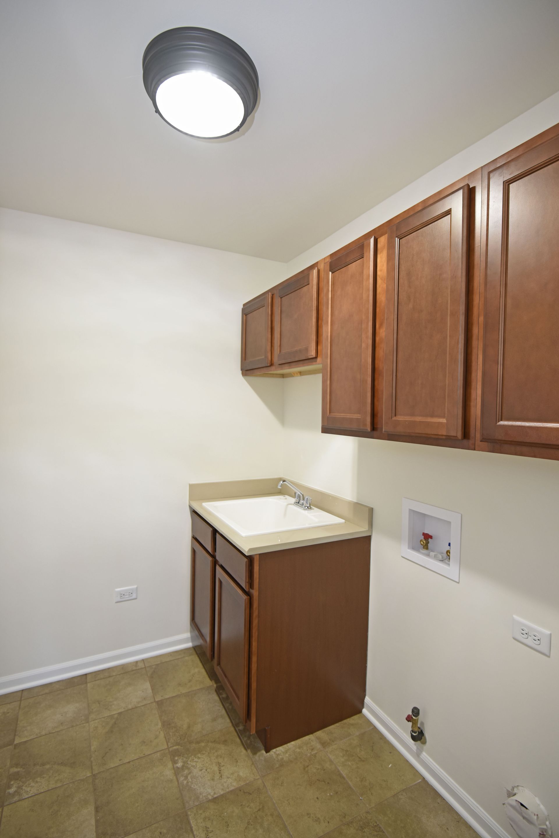 A large wooden shelf with a moose on it