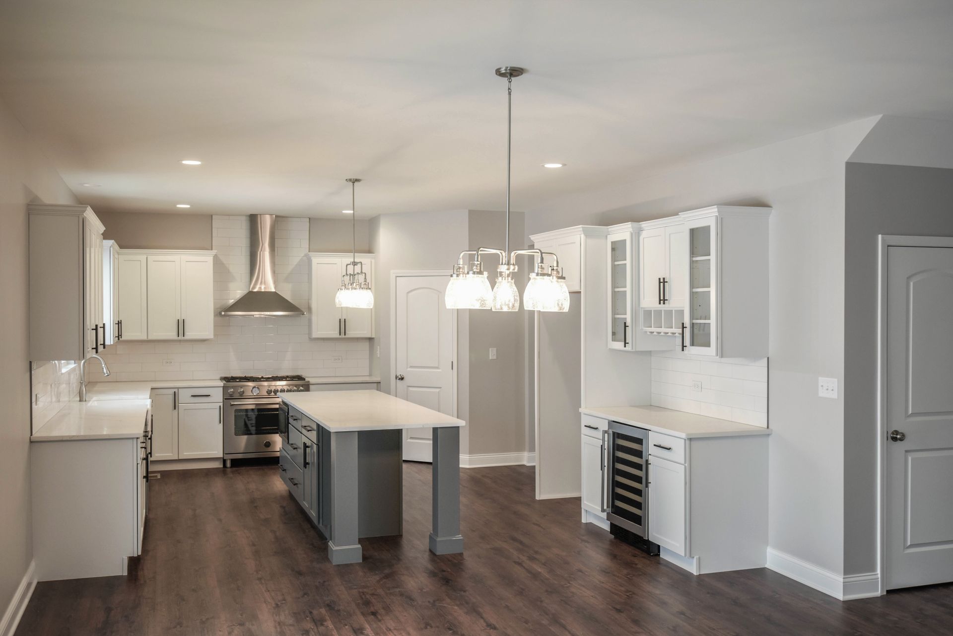 A kitchen with stainless steel appliances and granite counter tops