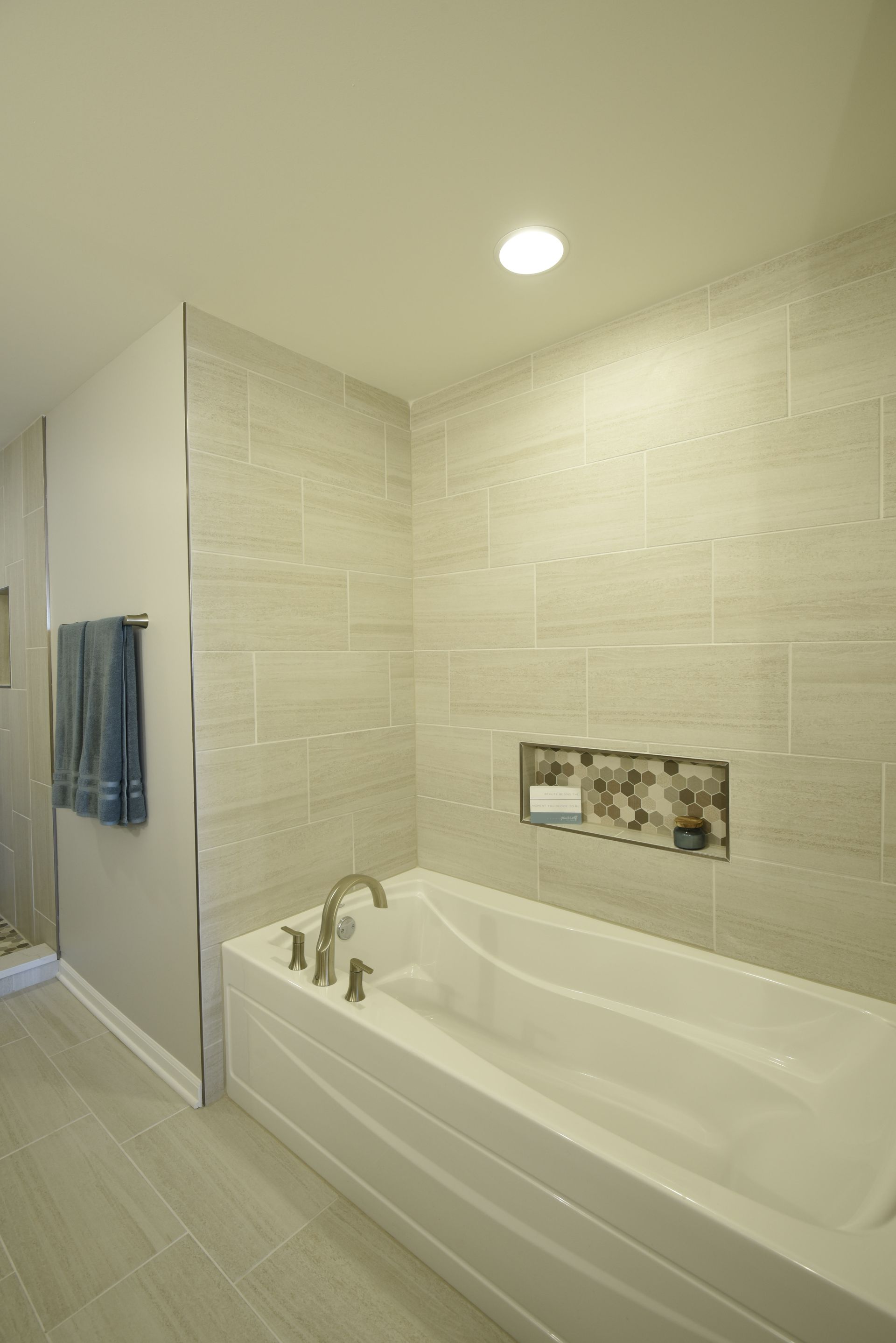 A bathroom with two sinks and a toilet.