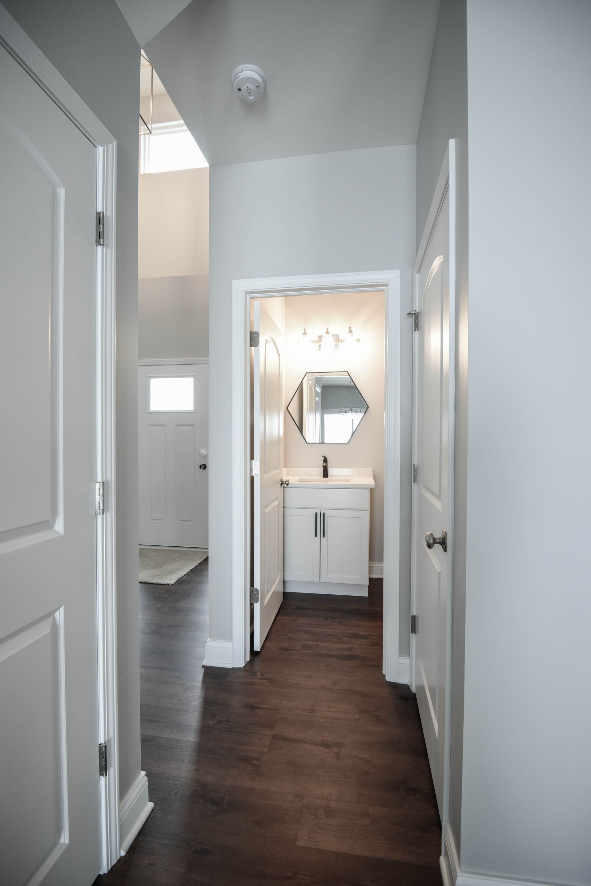 A kitchen with stainless steel appliances and a large island.