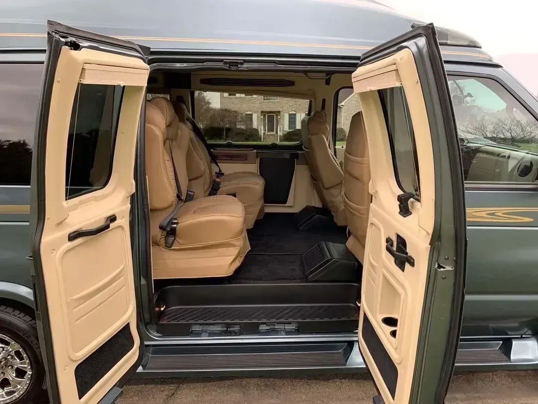 The inside of a van with the doors open.
