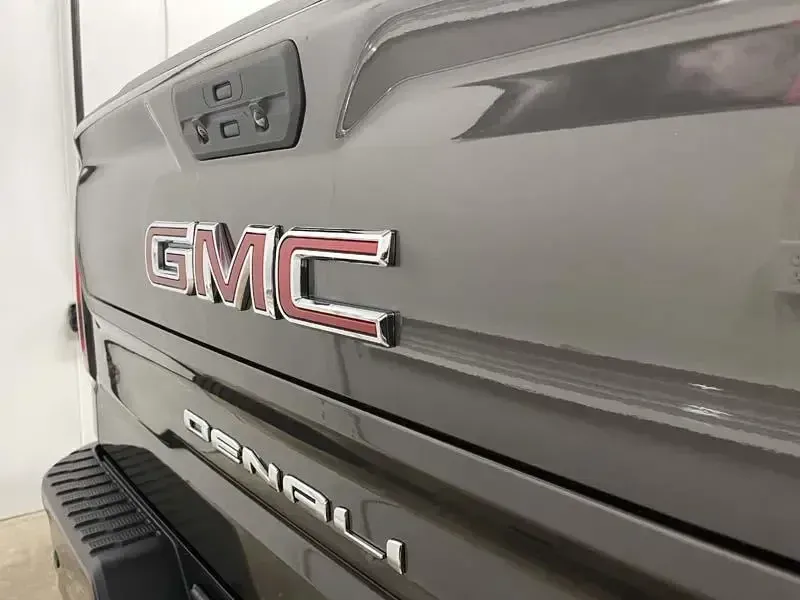 The back of a gmc denali truck is shown.