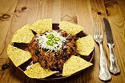 Plate with Mexican food on a table